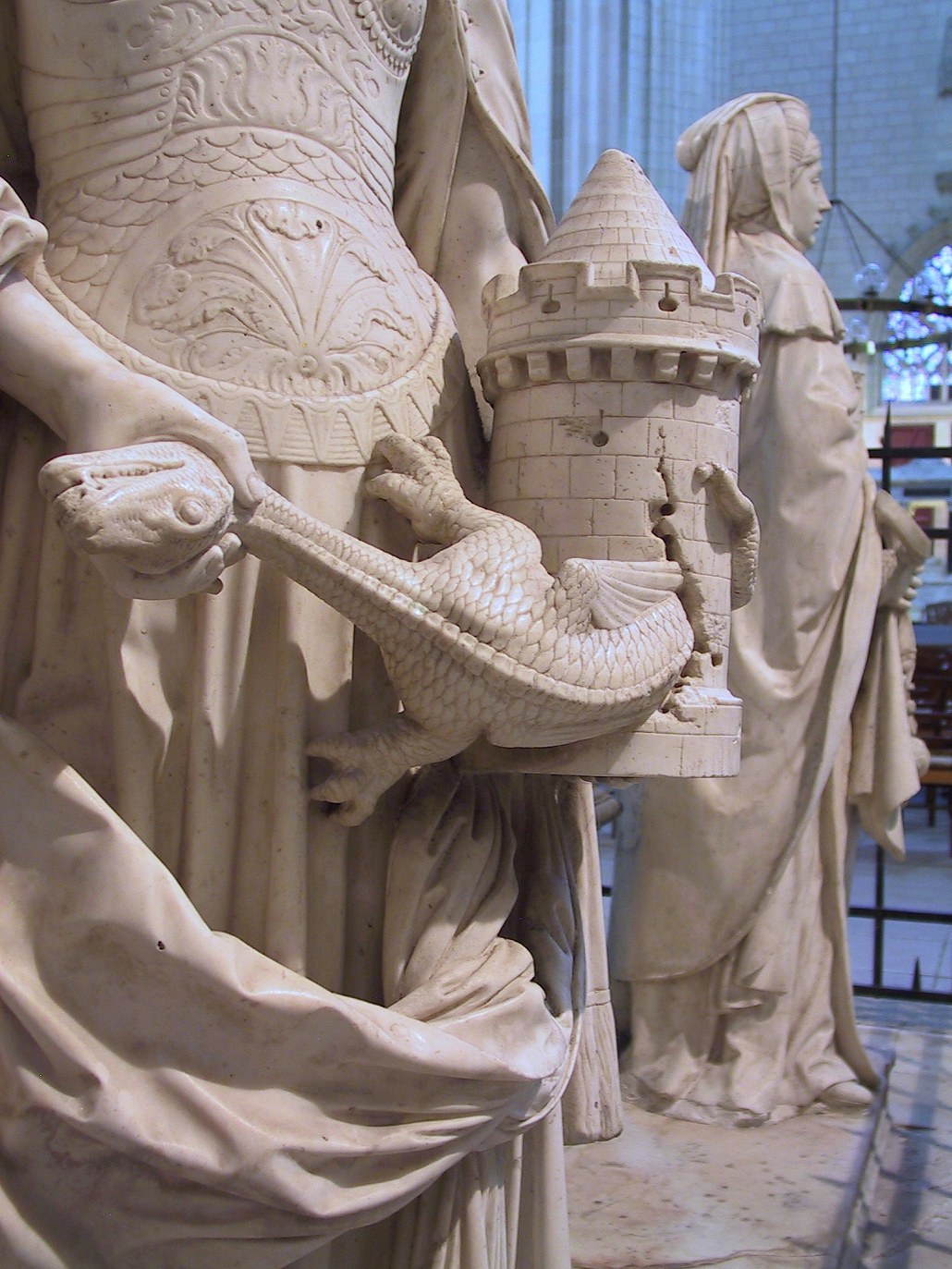 Michel Colombe, tombeau des Carmes. Statue de la force. La tour et son dragon